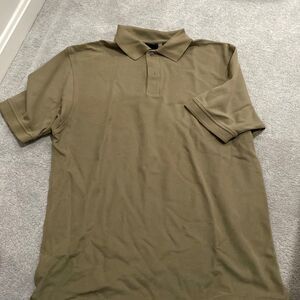 Olive green polo, short sleeve, hundred percent cotton, M travelers collection